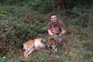 Frankie with his first bow buck kill with the bow and arrow!